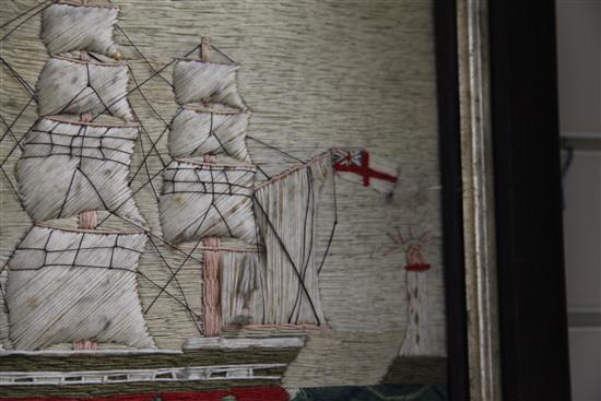 A Victorian woolwork ship picture depicting a frigate and lighthouse, 12.5 x 15.5in.
